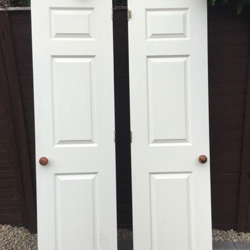 2 internal 3 panel wooden doors-white