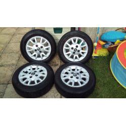 nissan 15 inch alloy wheels nearly new tyres